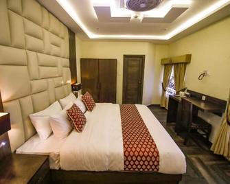 Jhelum Inn Hotel - Alessandria Bucefala - Camera da letto