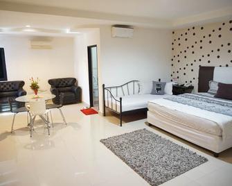 Mangga Dua Hotel Makassar - Makassar - Bedroom