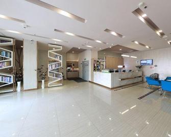Grace Inn (Linyi Tongda Road Hexie Plaza) - Linyi - Front desk