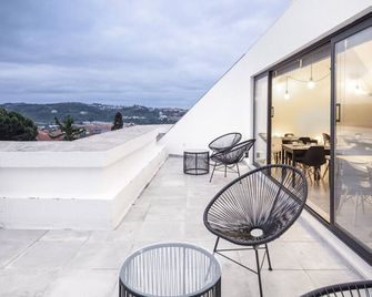 بينيدو دا ساودادي سويتس آند هوستل - كويمبرا - شرفة