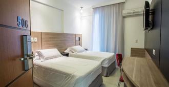 Atlântico Golden Apart Hotel - Santos - Schlafzimmer