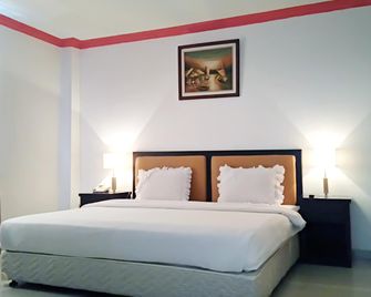 Parai City Garden Hotel - Sawahlunto - Sawah Lunto - Bedroom