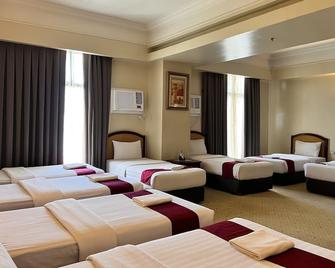 Sarrosa International Hotel and Residential Suites - סבו סיטי - חדר שינה