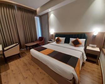 Hotel Golden Orchid - Lucknow - Bedroom