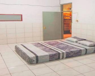 Rumah Singgah Manado Home Stay - Manado - Schlafzimmer
