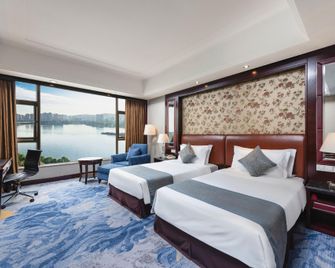 Qingyuan International Hotel - Qingyuan - Schlafzimmer