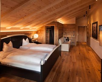 Dolomites Living Hotel Tirler - Castelrotto - Soveværelse