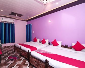 Flagship 13686 Rudraksh Hotel - Rāmnagar - Habitación