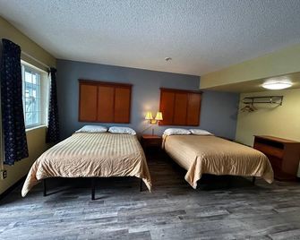 Travelers Inn By OYO Longview Kelso - Longview - Ložnice