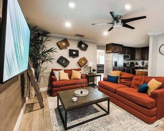 Travel Themed Property with Backyard Oasis - Maitland - Living room