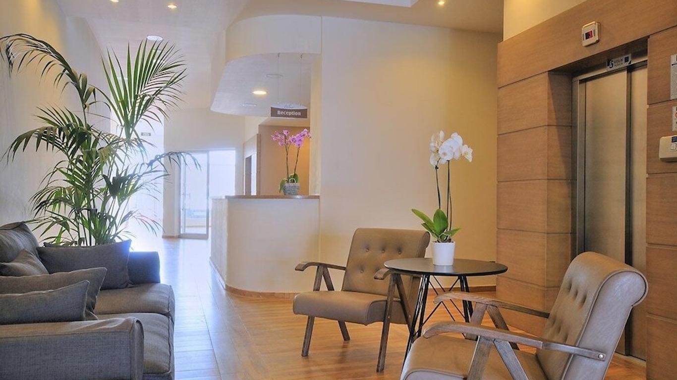 Delmar Suites & Residence
