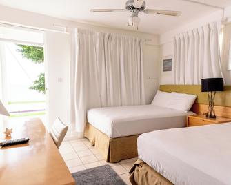 Ocean's Edge Lodge Restaurant & Bar - רוזו - חדר שינה