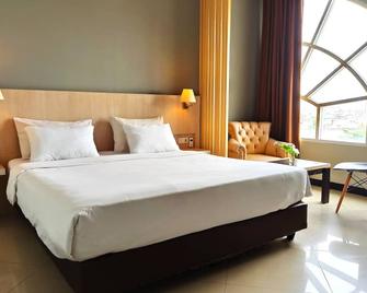 Rio City Hotel - פלמבאנג - חדר שינה