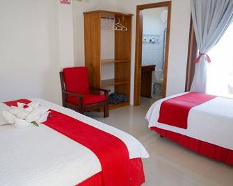 Tour to volcan, swim with sharks! Double Room Suite #1 - Puerto Villamil - Camera da letto