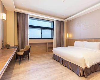 Euphoria Hotel - Lukang - Schlafzimmer