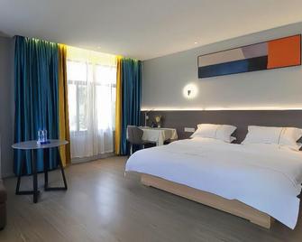 Pinshang Boutique Hotel Liuzhou - Liuzhou - Schlafzimmer