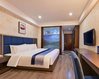 Aifei Hotel (Hangzhou Xiaoshan Auto City Tonghui North Road) - Hangzhou - Bedroom