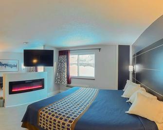 Coratel Inn & Suites by Jasper Hastings - Hastings - Bedroom