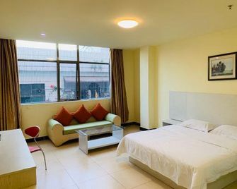 8 Inn Hotel (Dongguan Shijie Jiarong Shopping Plaza) - Dongguan - Habitación