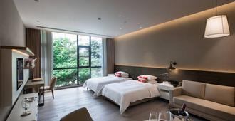 Swisstouches Guangzhou Hotel Residences - Quảng Châu - Phòng ngủ