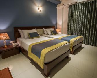 Ceyloni City Hotel - Kandy - Yatak Odası