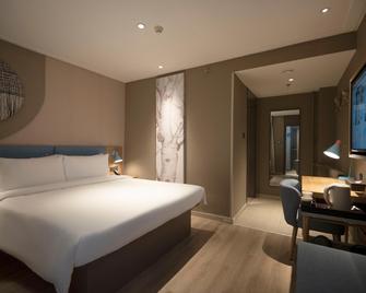 Home Inn (Urumqi Beijing South Road Railway Bureau Metro Station) - Ürümqi - Habitación