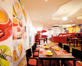 Vienna House Easy by Wyndham Rostock - רוסטוק - מסעדה