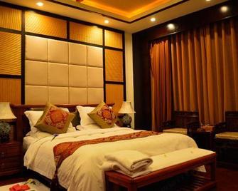 Rehai Meinvchi Hot Spring Hotel - Baoshan - Bedroom