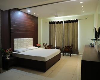 Rutbah Hotel And Restaurant - Mandi Gobindgarh - Bedroom