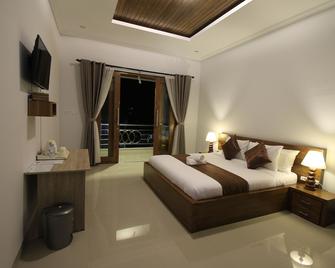 Green Beach Inn - Nusa Penida - Schlafzimmer