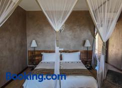 Isalo Rock Lodge - Ranohira - Habitación