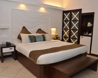 Sonesta Inns Beach Resort - Candolim Beach - Candolim - Κρεβατοκάμαρα