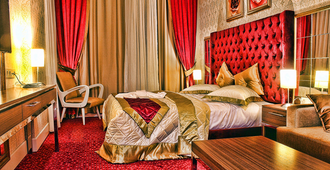 Shams Al-Basra Hotel - Ar Ribāţ aş Şaghīr - Bedroom
