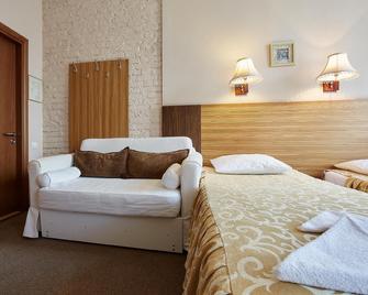 Vasilievsky Island Mini-Hotel - سانت بيترسبورغ - غرفة نوم