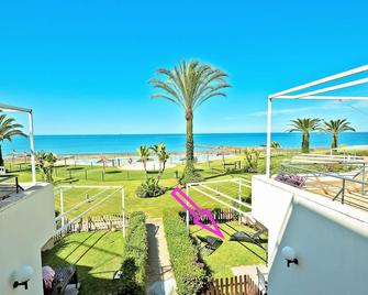 On Beach Deluxe Apartment with Pools and own Garden - El Puerto de Santa María - Balcony