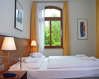 Hotel & Apartments Fürstenhof am Bauhaus - Weimar - Habitación