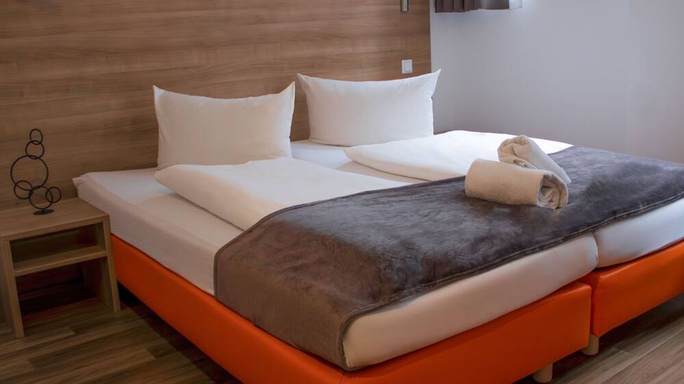 Orange Hotel und Apartments