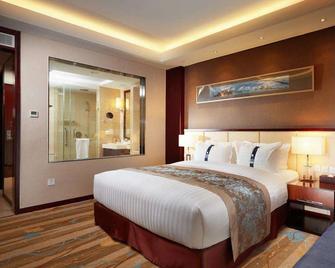Beijing Hotel - Minsk - Schlafzimmer