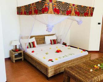 Albatross Ocean View Hotel - Pingwe - Bedroom