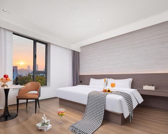 Baotou Distance Hotel (Baobaiwangfujing Victory Branch) - Baotou - Bedroom