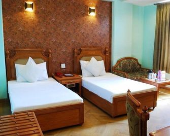 Hotel Sunstar Grand - New Delhi - Bedroom