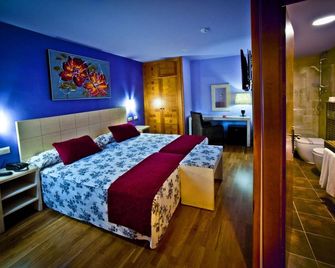 أوتيل كوندس دي كاستيلا - شقوبية - غرفة نوم