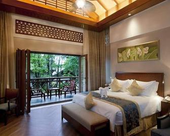 Wuzhishan Yatai Rainforest Resort - Wuzhishan - Bedroom
