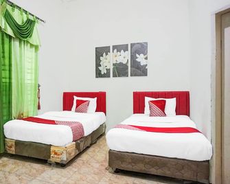 Hotel O Banda Aceh near Masjid Raya Baiturrahman - Banda Aceh - Habitació