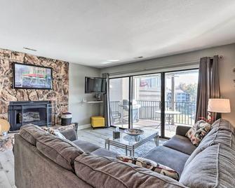 Fireplace and Grill Bright Lake Ozark Condo! - Lake Ozark - Living room