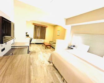 America's Best Inns Flowood - Flowood - Schlafzimmer