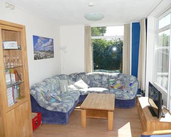 Park Vredelust: Renovated bungalow for 6 persons, incl. bicycles - De Koog - Huiskamer