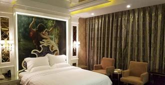 Golden Island Holiday Hotel Foshan - Foshan - Bedroom