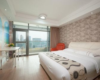 Yicheng Apartment Hotel (Guangzhou East Railway Station Vili International) - Guangzhou - Bedroom