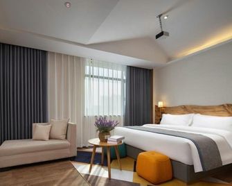 Pengbo Hotel (Changsha Window of the World Colorful Box Branch) - צ'נגשה - חדר שינה